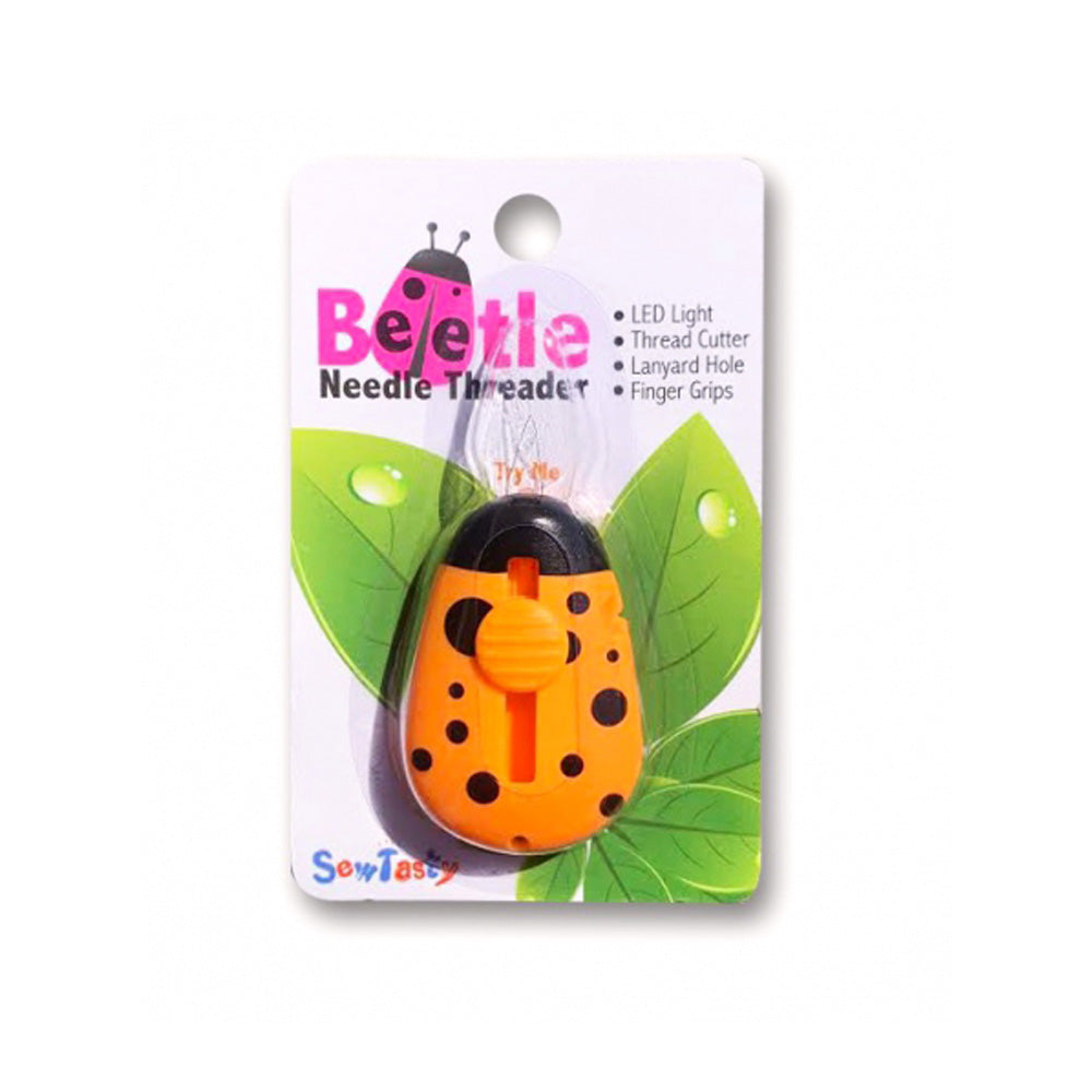 Enhebrador con luz mariposa